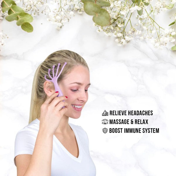 a woman illustrating how the mini prong head massager can help relieve headaches, massage and relax, boost immune system against a white background with flowers above her