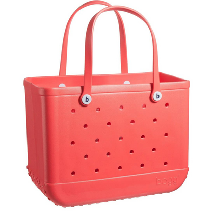 coral bogg bag on a white background
