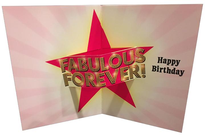 inside of card has a pop out that reads fabulous forever happy birthday with a star