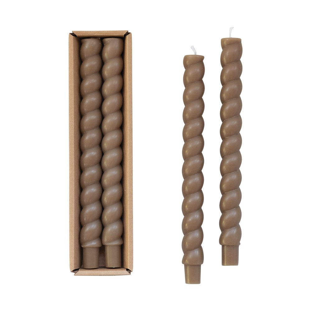 box of two olive twisted tapers next to two open on a white background