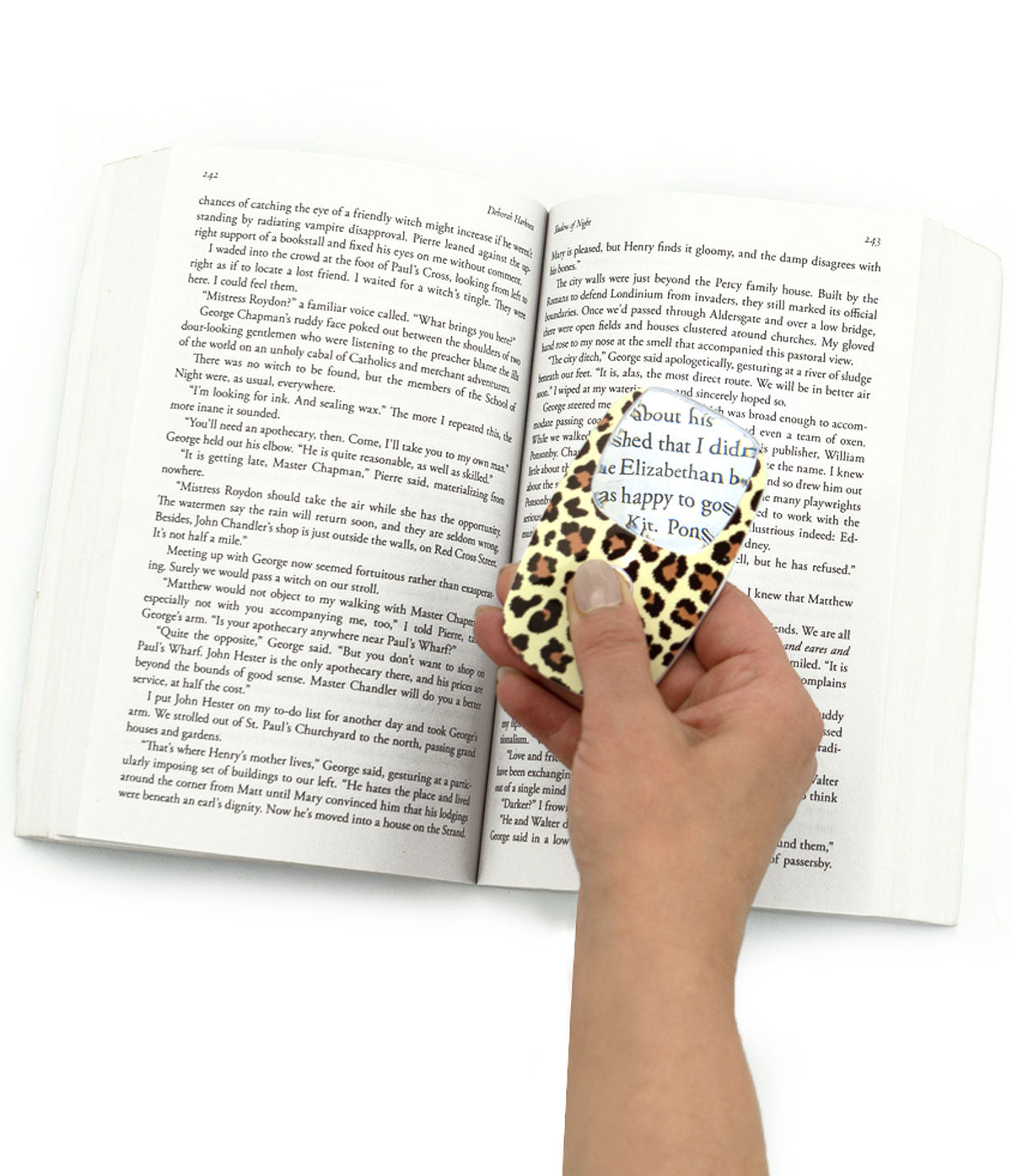 a person illustrating the use of an getaway opticard with a book on a white background 