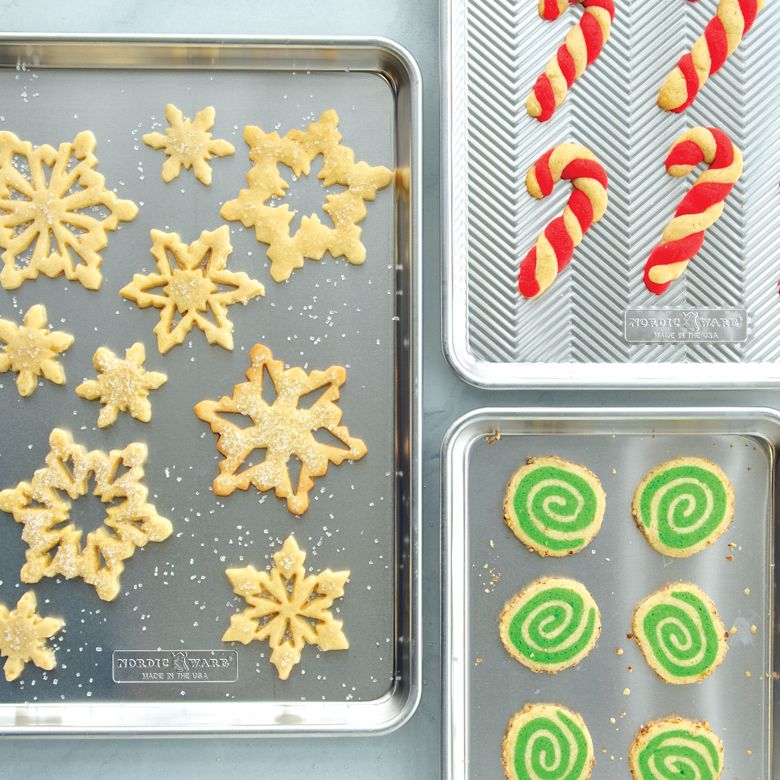 quarter sheet pans filled with cookies.