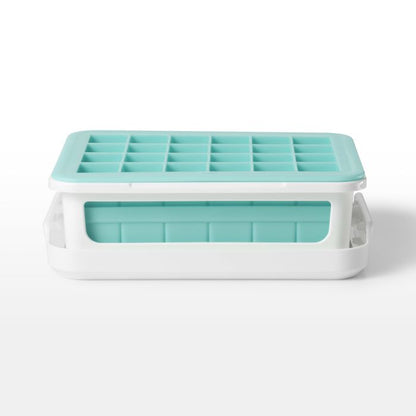 blue silicone ice trays stacked with white frame.