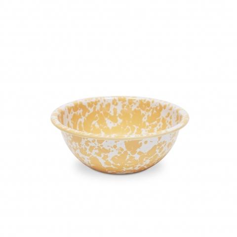 small yellow serving bowl on a white background