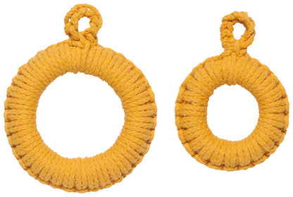 large and small yellow trivets.
