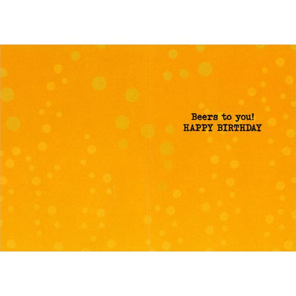 inside of card is a yellow background with bubbles looking like beer and text beers to you happy birthday