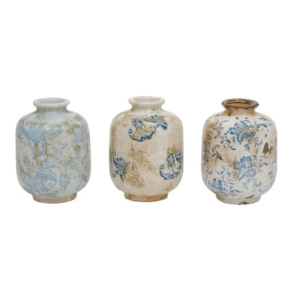 3 styles of off-white distressed vases with blue patterns in a row on a white background.