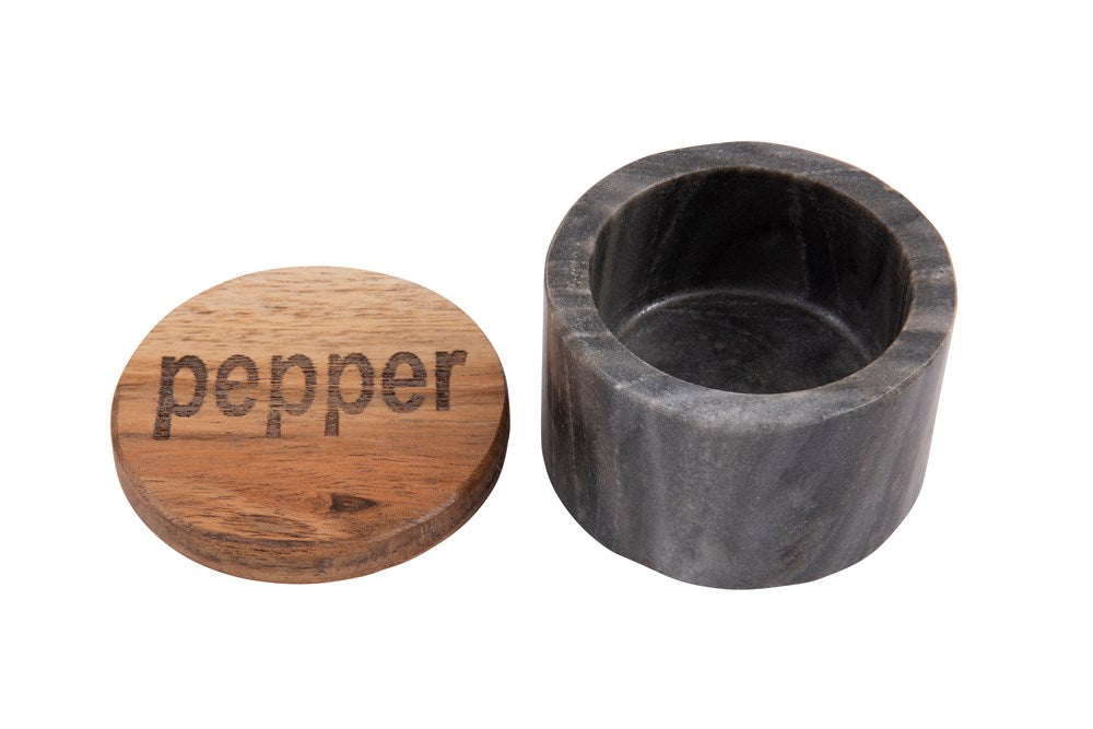 marble pepper pot with wood lid beside it on a white background