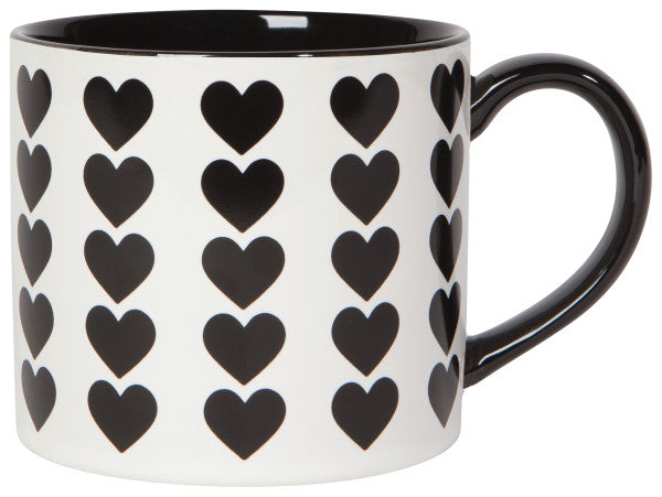 white mug covered in rows of black hearts, a black interior, and black handle.