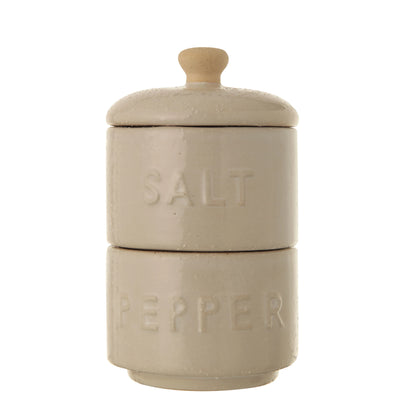 stacked ceramic pots with raised lettering "pepper" on bottom pot and "salt" on top pot and a lid on top.