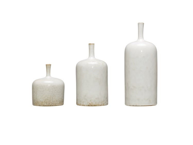 three sizes of stoneware vases on a white background