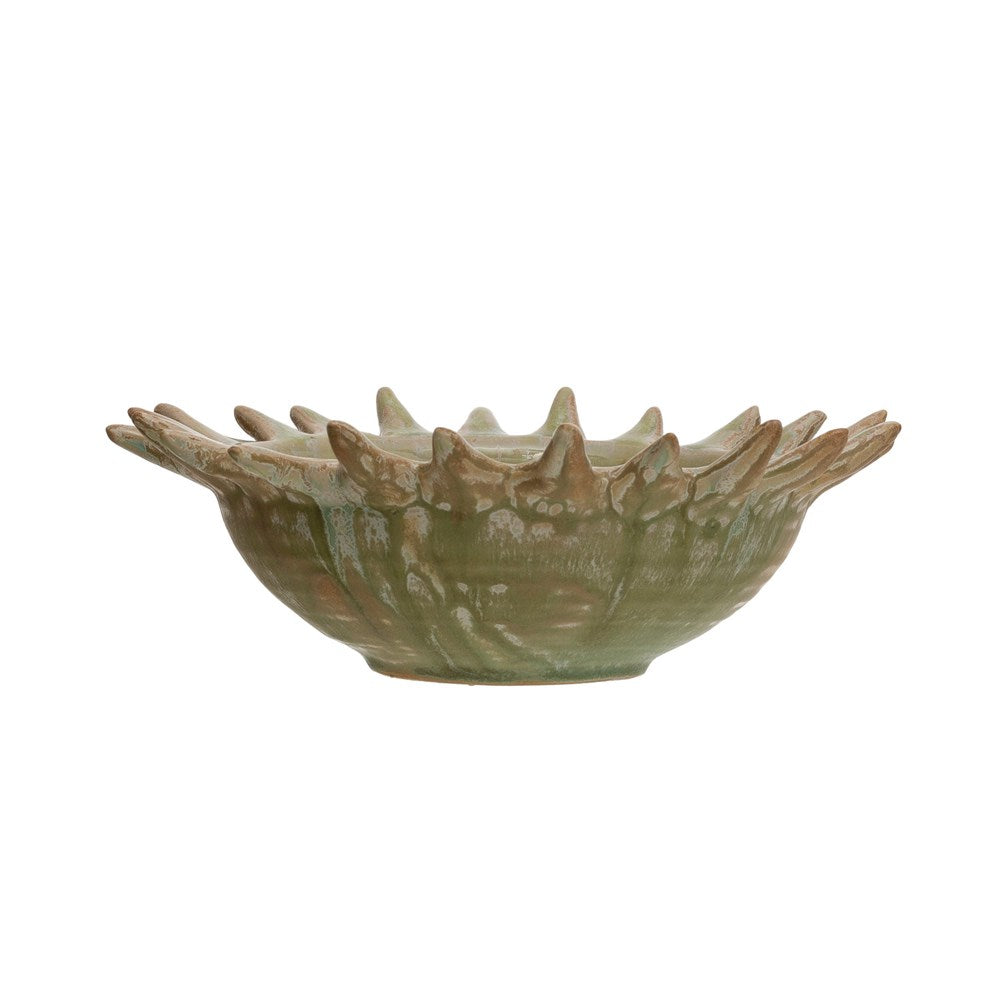 side view of the stoneware sunburst bowl on a white background