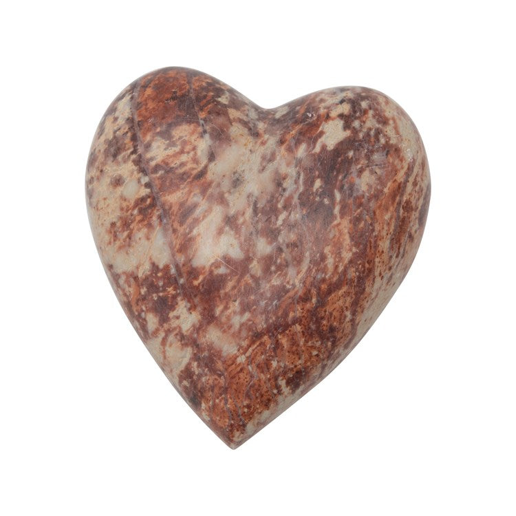 red and tan soapstone heart displayed on a white background