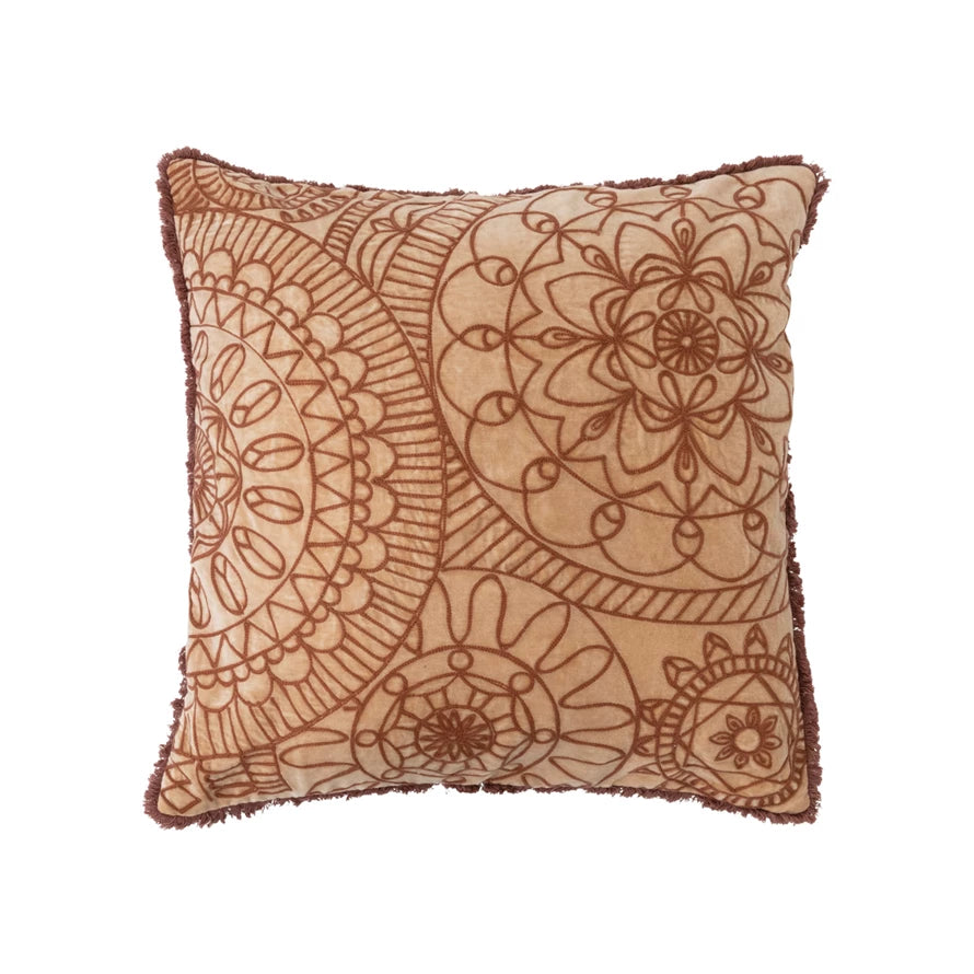 stonewashed clay colored cotton embroidered velvet pillow with on a white background