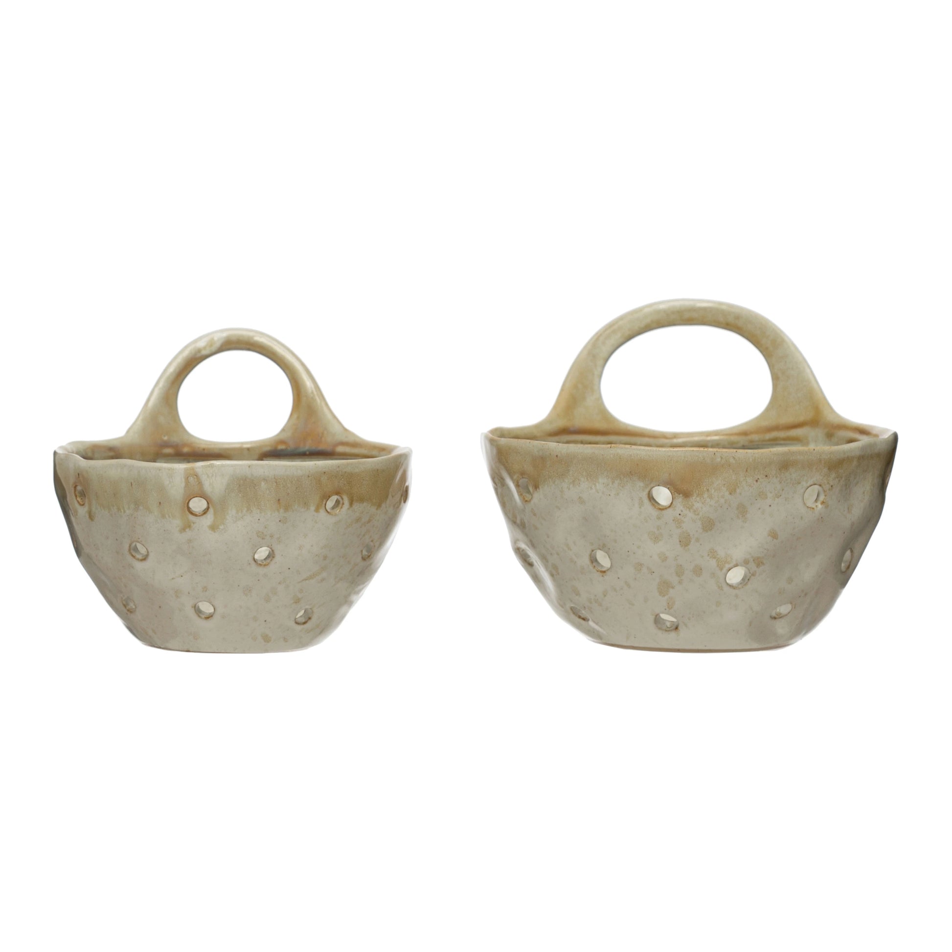 front view of the small and large stoneware colanders with handles on a white background