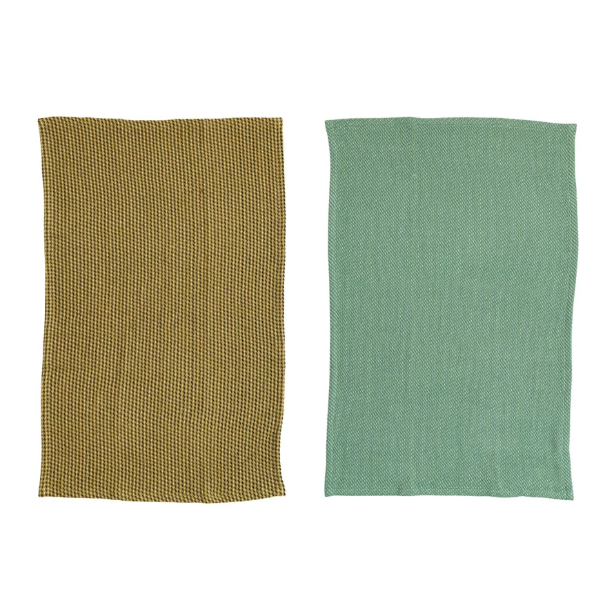 2 dishtowels, 1 olive green, the other blue green, laying flat.