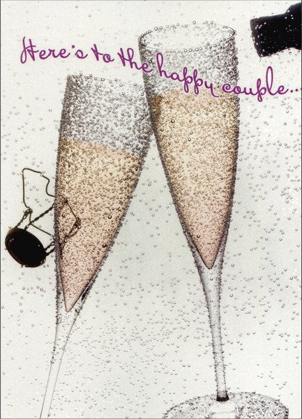 front of card is a drawing of champagne glasses and a bottle of champagne and text here's to the happy couple