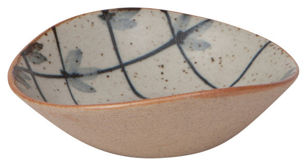 small bowl with blue lines and leaf designs on the interior.