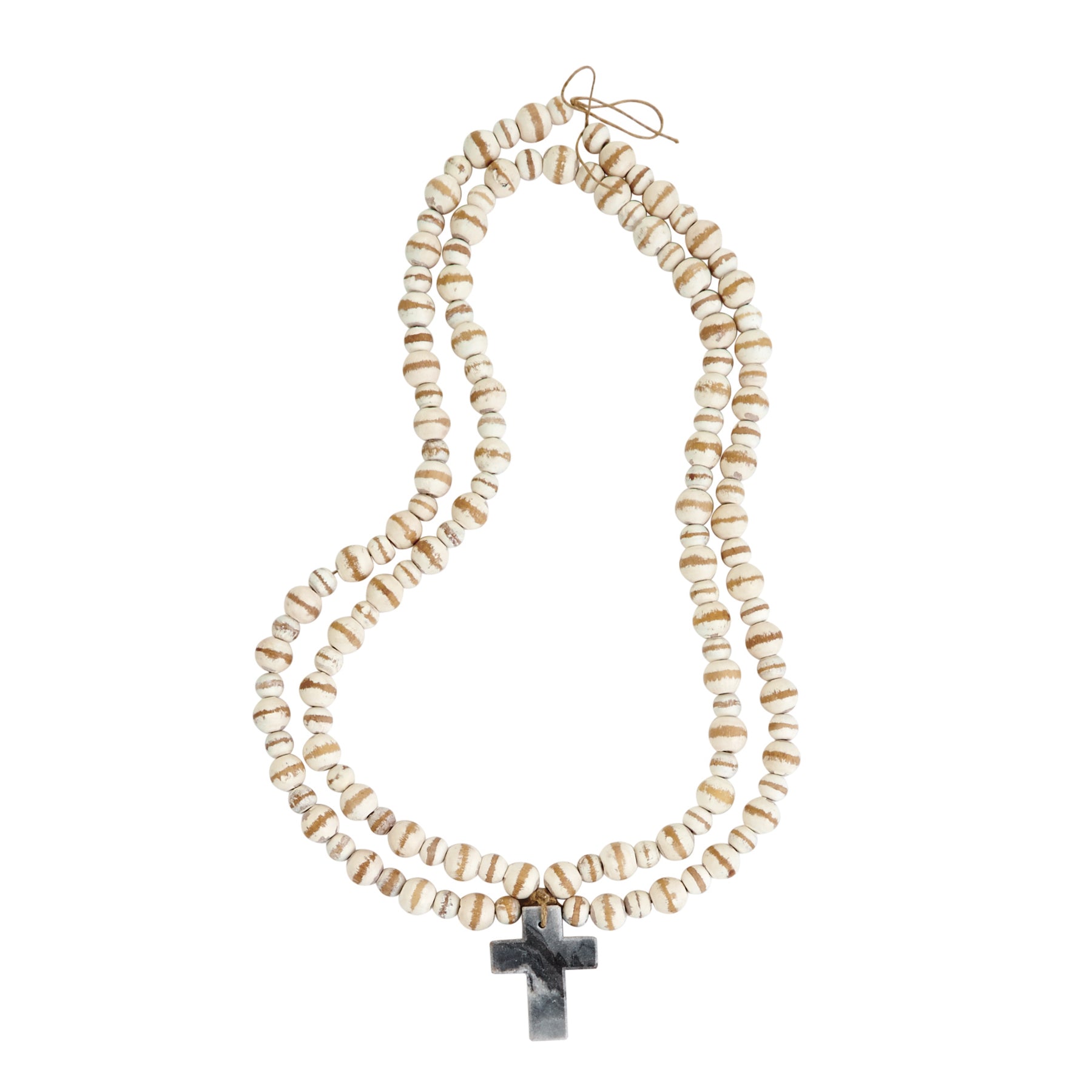 gray marble cross with wood beads on a white background