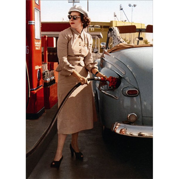 front of card has old photo of a woman pumping fuel with a dalmatian in the front seat