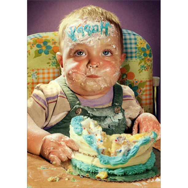 front of card is a photograph of a baby boy with birthday cake smeared all over his face