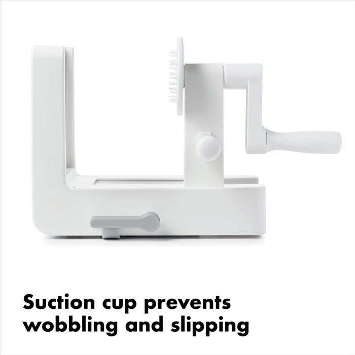 side view of spiralizer with text "suction cup prevents wobbling and slipping".