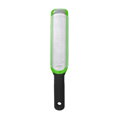 zester with green frame and black handle.