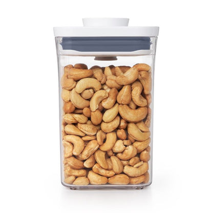 pop container filled with cashews.