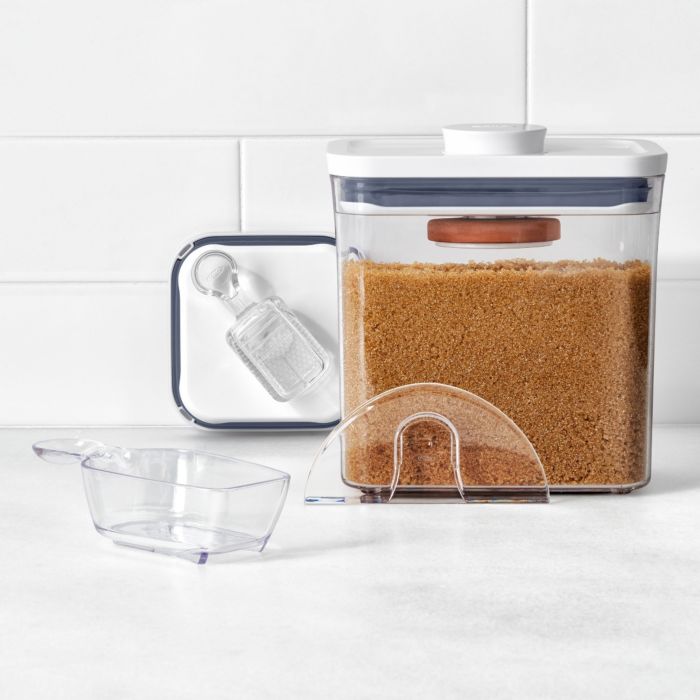 pop container accessories on countertop with container of brown sugar.