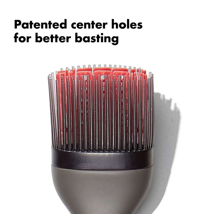 close-up of bristles with text "patented center holes for better basting".
