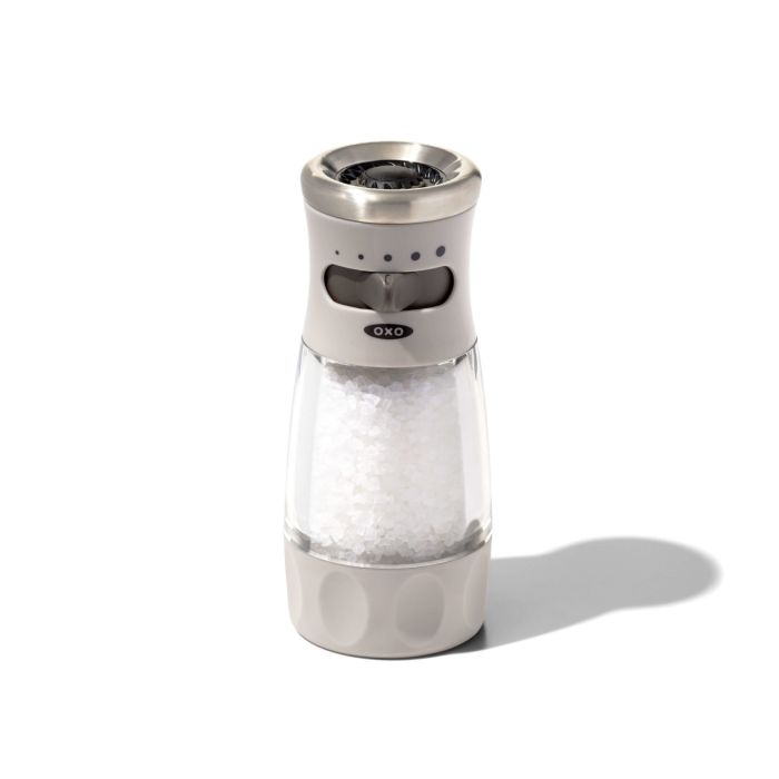 white and clear acrylic salt grinder.