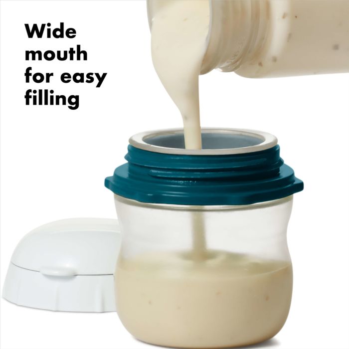 bottle bring filled with creamy dressing and text "wide mouth for easy filling".