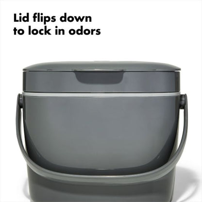 compost bucket and text "lid flips down to lock in odor".