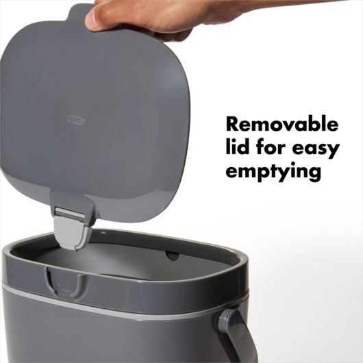 hand removing lid from bucket with text "removable lid for easy emptying".