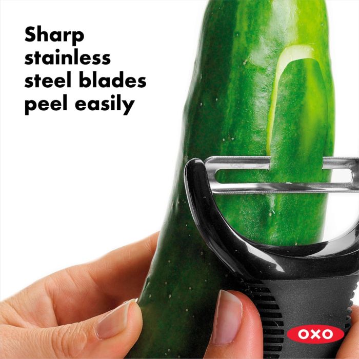close-up of hands peeling cucumber with text "sharp stainless steel blades peel easily".