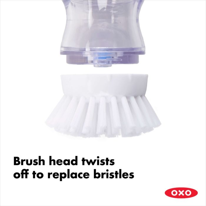 close-up of bristles removed with text "brush head twists off to replace bristles".