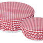 small and large gingham bowl covers are red and white checked displayed on bowls against a white background