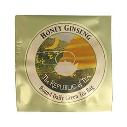 individual packet of honey ginseng green tea on a white background