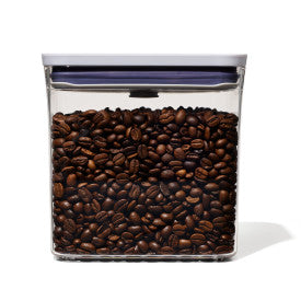 pop container filled with coffee beans.