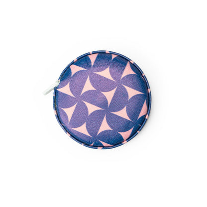 pink and blue mini tape measure on a white background