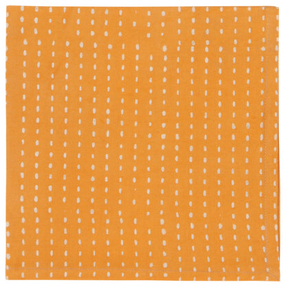 yellow napkin with white dashed lines.