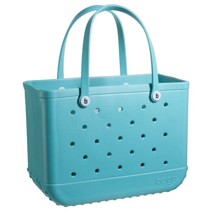 turquoise bogg bag on a white background