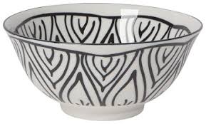 white ceramic bowl with black wavy pattern inside and out.