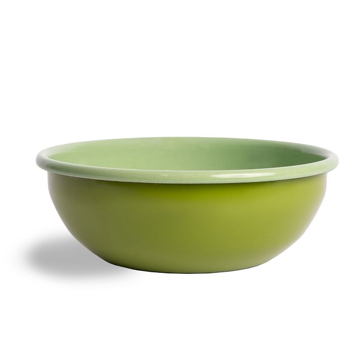 enamel bowl that in bright green on the exterior and light green on the interior.