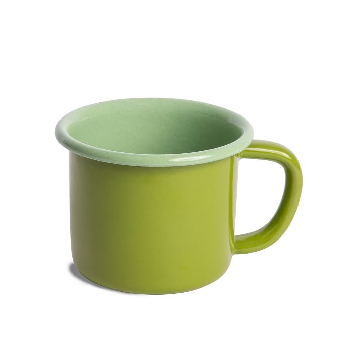 enamel mug that is bright green on the exterior and light green on the interior.