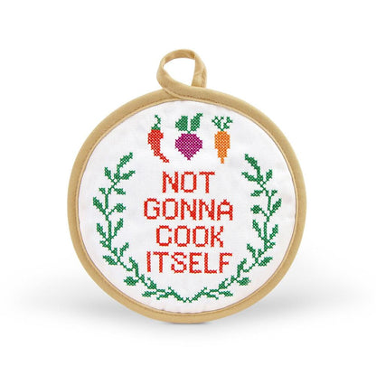 in stitches pot holder with text "not gonna cook itself" on a white background