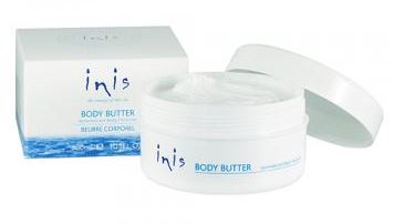 body butter displayed open next to the package on a white background