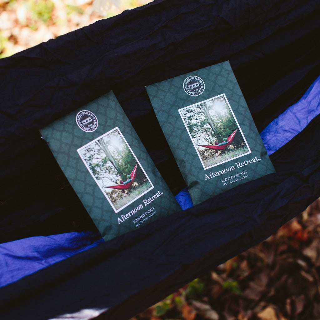 two afternoon retreat sachet outside in a hammock 