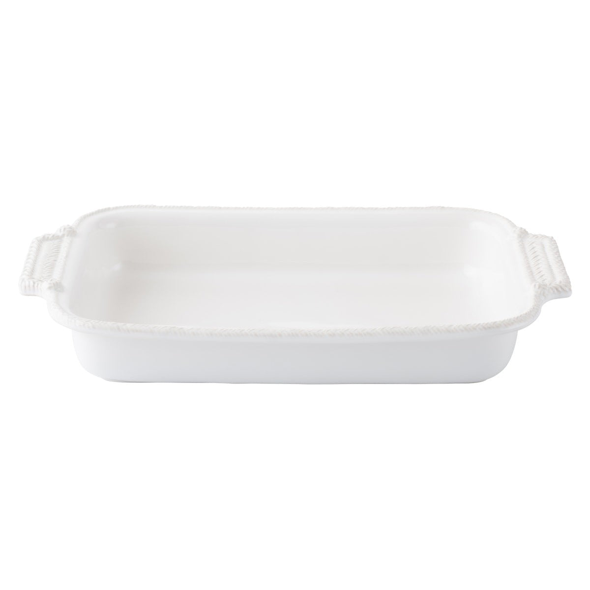 angled view of the le panier rectangle baking dish on a white background 