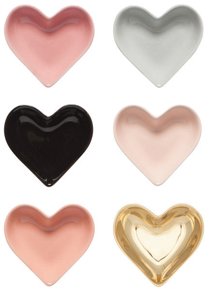 six different color heart pinch bowls on a white background